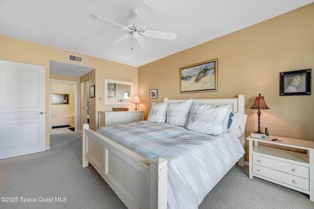 bedroom with light colored carpet and ceiling fan