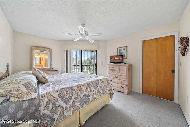 bedroom with ceiling fan, light colored carpet, a textured ceiling, and access to outside