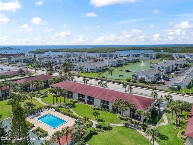 drone / aerial view with a water view