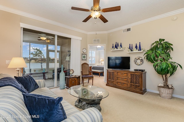 living room with light colored carpet and crown molding