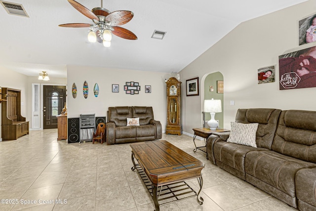 living room featuring light tile patterned flooring, lofted ceiling, and ceiling fan