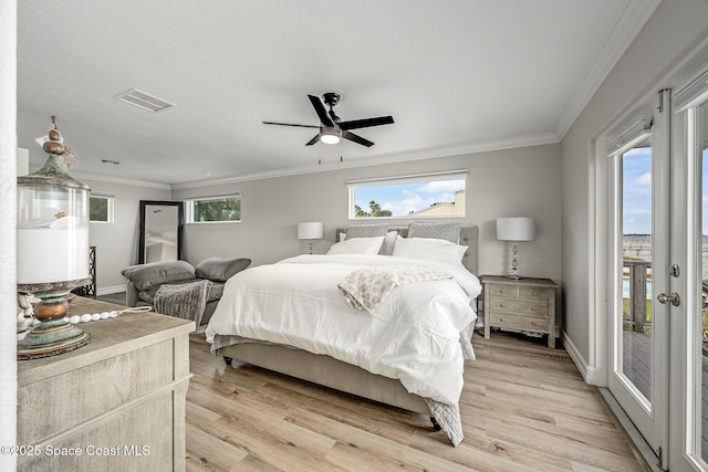 bedroom featuring ceiling fan, access to exterior, light hardwood / wood-style floors, and ornamental molding