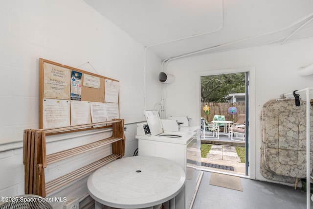 405 Adams Ave Unit 10, Cape Canaveral, FL 32920 - bathroom featuring washer / clothes dryer and concrete flooring