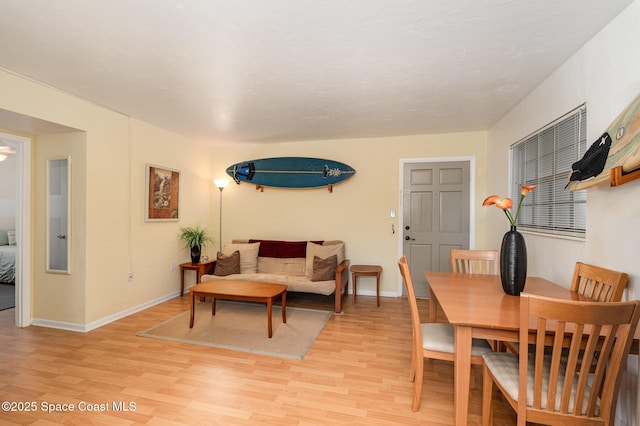 405 Adams Ave Unit 10, Cape Canaveral, FL 32920 - dining area featuring light wood-style flooring