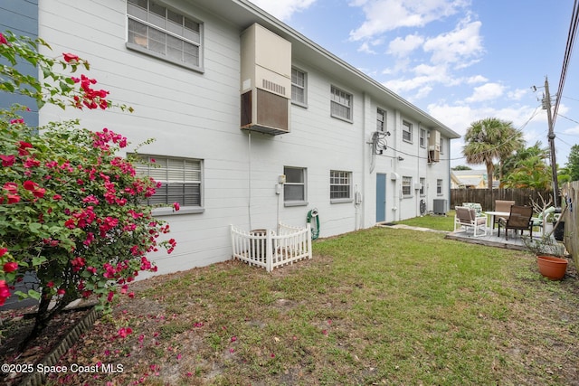 405 Adams Ave Unit 10, Cape Canaveral, FL 32920 - rear view of property featuring a patio