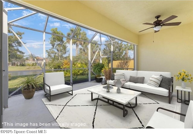 sunroom / solarium with ceiling fan