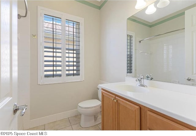 bathroom with tile patterned floors, a shower, vanity, and toilet