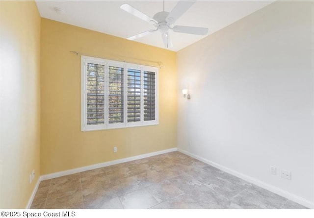 unfurnished room with ceiling fan