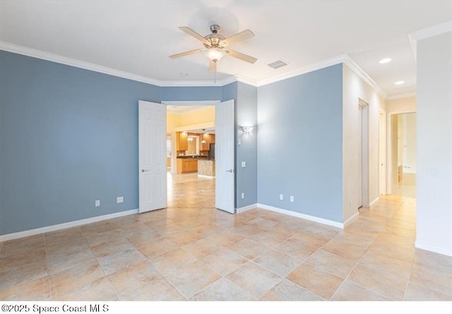 unfurnished room featuring ceiling fan and ornamental molding