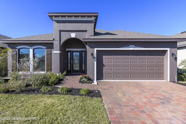 view of front of house with a garage