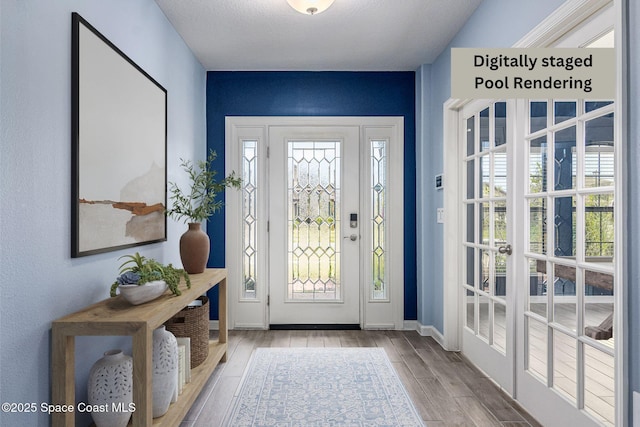 doorway with light hardwood / wood-style floors