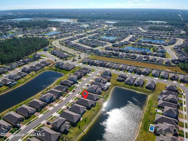 drone / aerial view featuring a water view