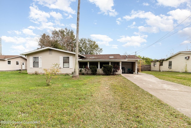 ranch-style house featuring a garage and a front yard