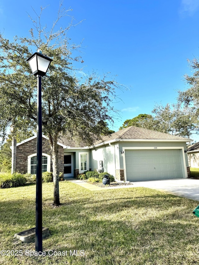 view of front facade with a garage and a front yard