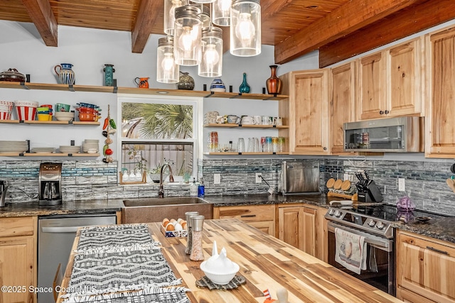 kitchen with stainless steel appliances, wooden counters, decorative light fixtures, and decorative backsplash