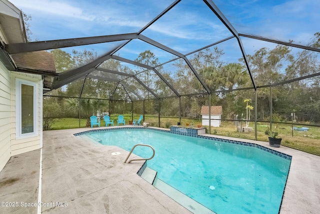 view of pool featuring a lanai and a patio