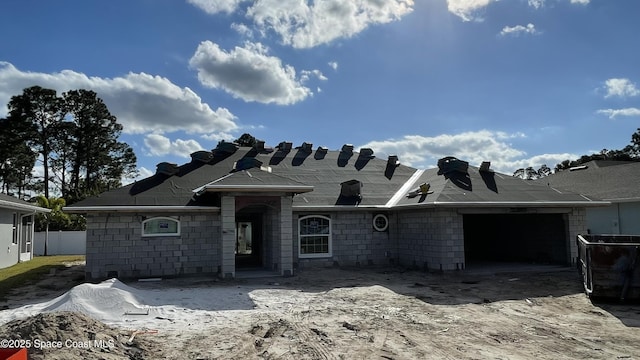 view of front of property with a garage