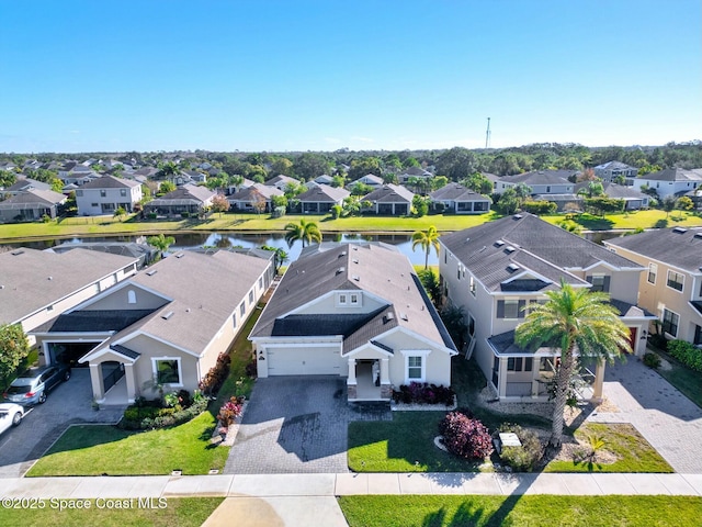 drone / aerial view featuring a water view