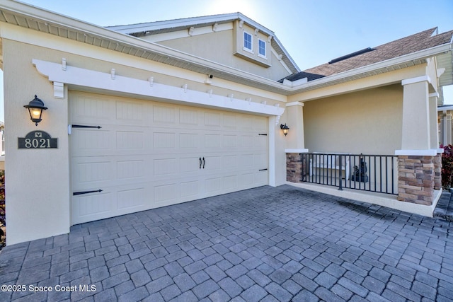 garage with covered porch