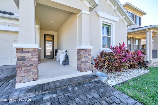 entrance to property with a porch