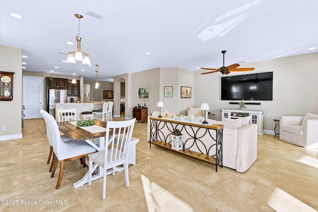 dining room with ceiling fan