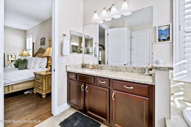 bathroom featuring vanity and tile patterned floors