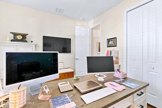 office space with hardwood / wood-style floors