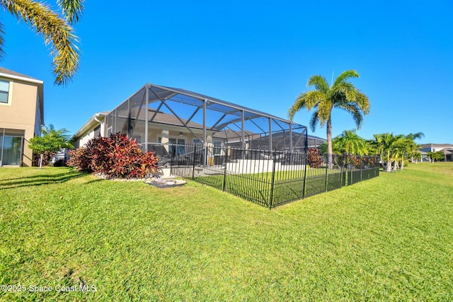 view of yard with a lanai