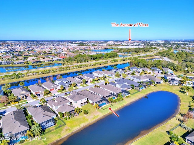 birds eye view of property featuring a water view