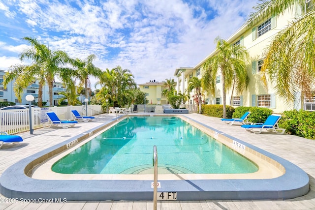 view of swimming pool featuring a patio