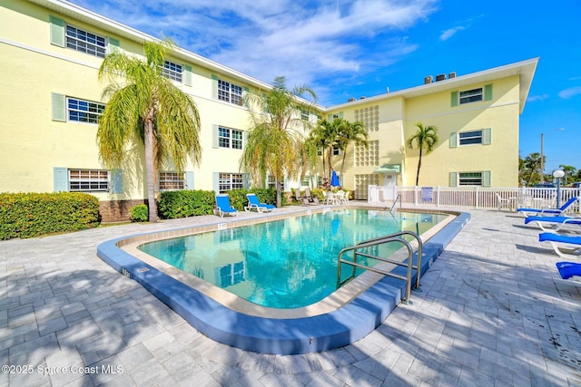 230 Columbia Dr Unit 113, Cape Canaveral, FL 32920 - community pool with a patio
