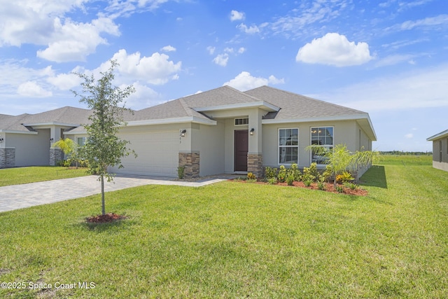 view of front facade featuring a front yard and a garage