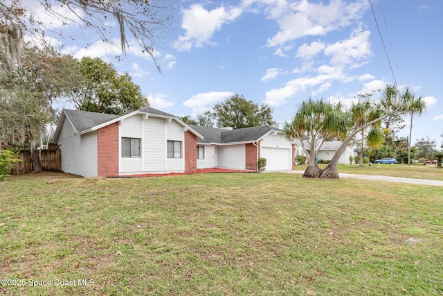 ranch-style house with a front yard and a garage