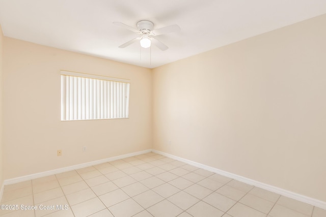 tiled empty room with ceiling fan