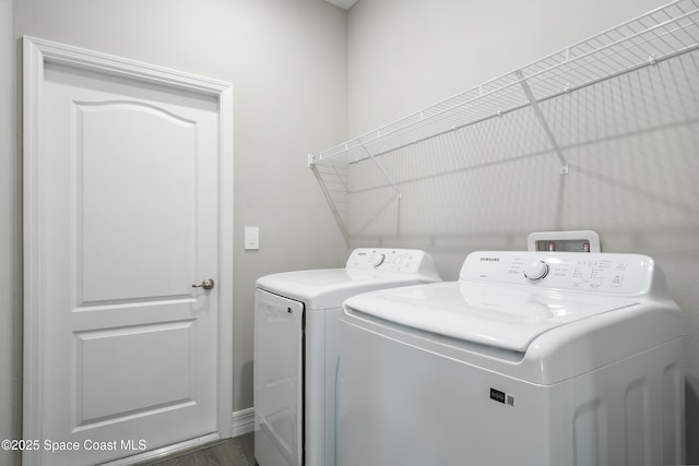 laundry area featuring independent washer and dryer