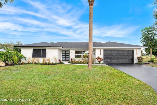 ranch-style home featuring a front yard and a garage