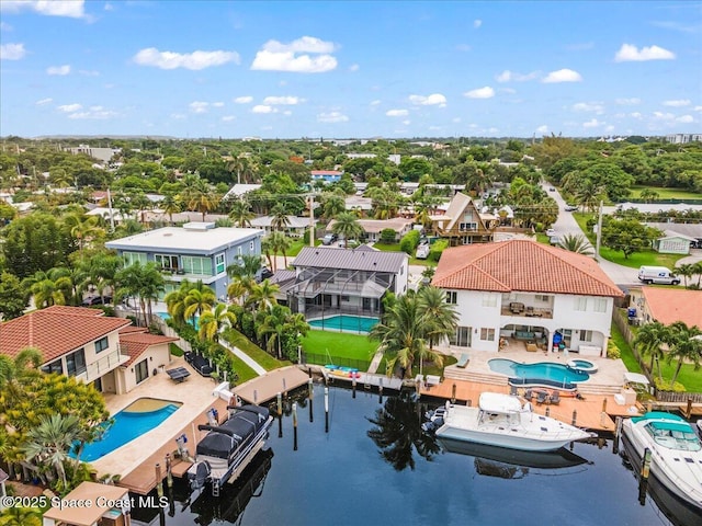 bird's eye view with a water view