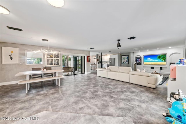 living room with concrete flooring