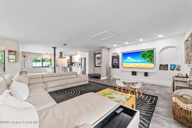 living room with concrete floors