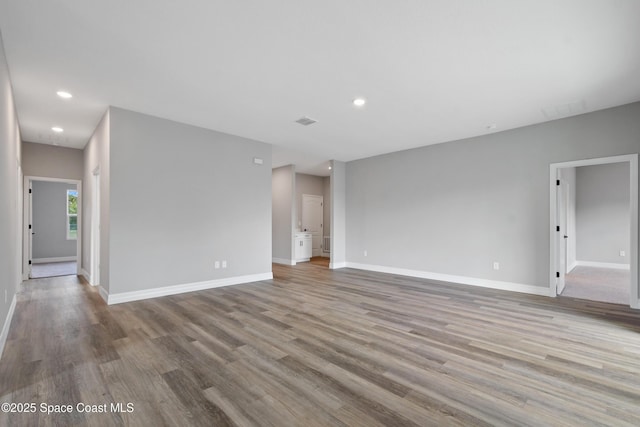 spare room featuring light wood-type flooring