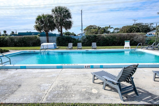 view of pool with a patio area