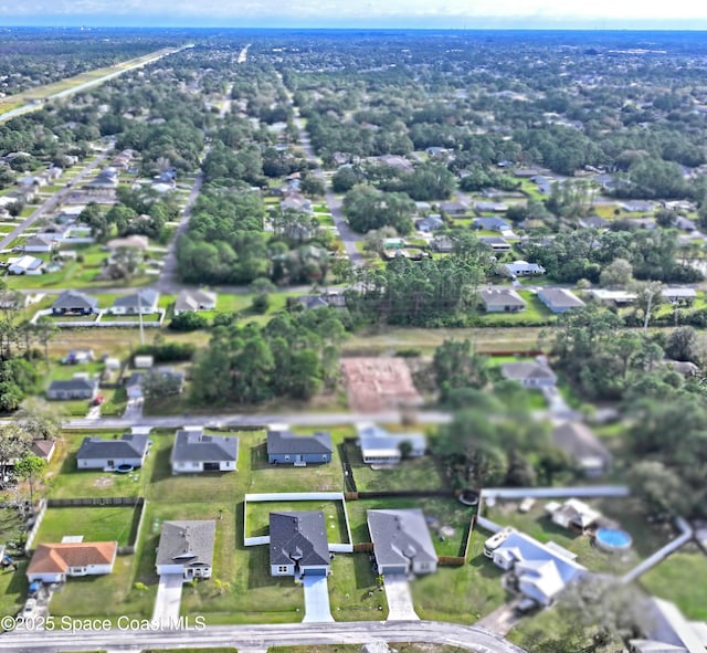 drone / aerial view with a residential view