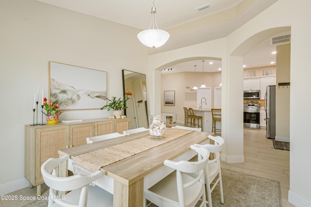 dining space featuring light hardwood / wood-style flooring