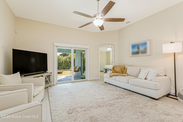 living room with ceiling fan