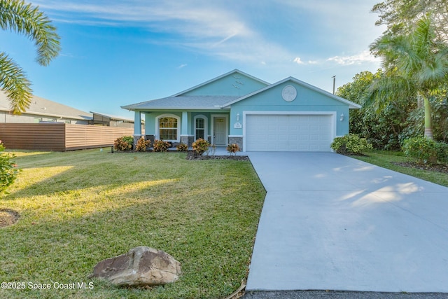 single story home with covered porch, a garage, and a front lawn