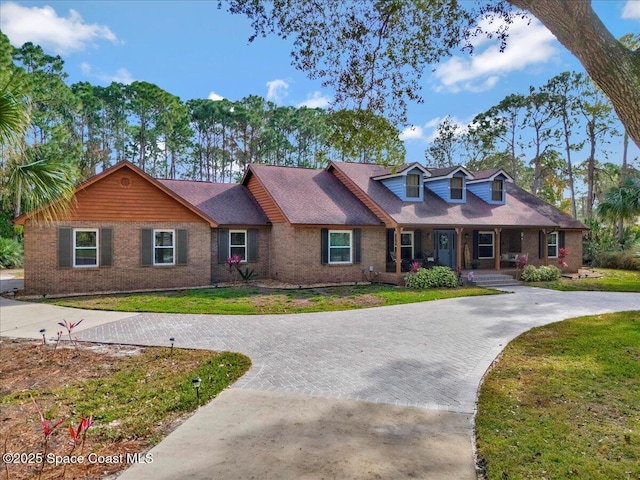 view of front of home with a front lawn