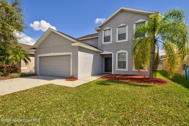 traditional home featuring a garage, driveway, a front yard, and stucco siding