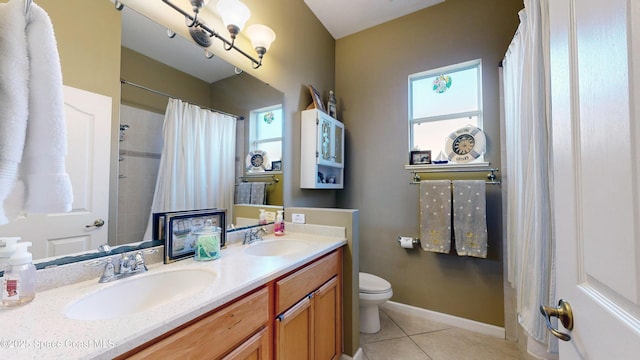 bathroom with tile patterned flooring, vanity, toilet, and a shower with shower curtain