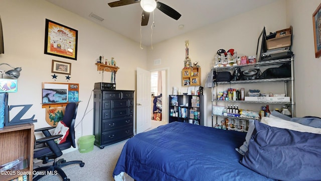 carpeted bedroom featuring ceiling fan