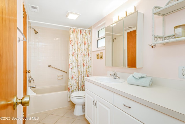 full bathroom featuring tile patterned flooring, vanity, shower / tub combo, and toilet